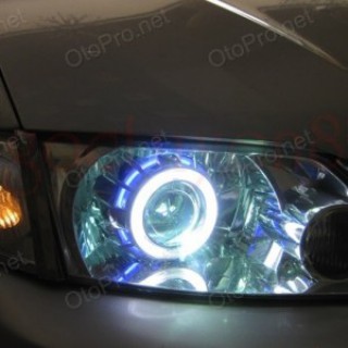 Độ đèn bi xenon, angel eyes LED cho xe Mazda Premacy