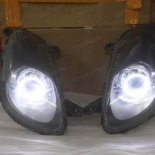 Độ đèn bi xenon, angel eyes LED kiểu BMW cho xe Pontiac