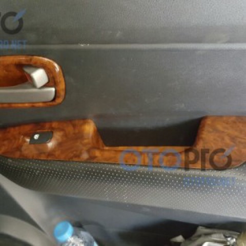 Sơn vân gỗ nội thất xe Kia Carens 2011