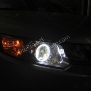 Độ đèn bi xenon, angel eyes LED khối cho xe Kia Forte