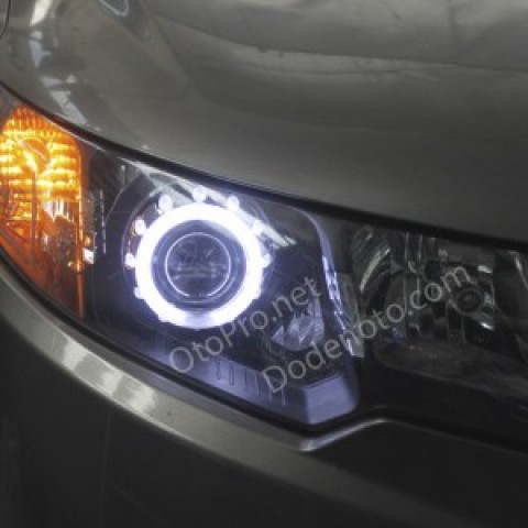 Độ đèn bi xenon, vòng angel eyes LED khối cho xe Forte