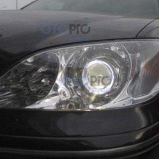 Độ đèn bi xenon, angel eyes LED kiểu BMW cho Camry 2005