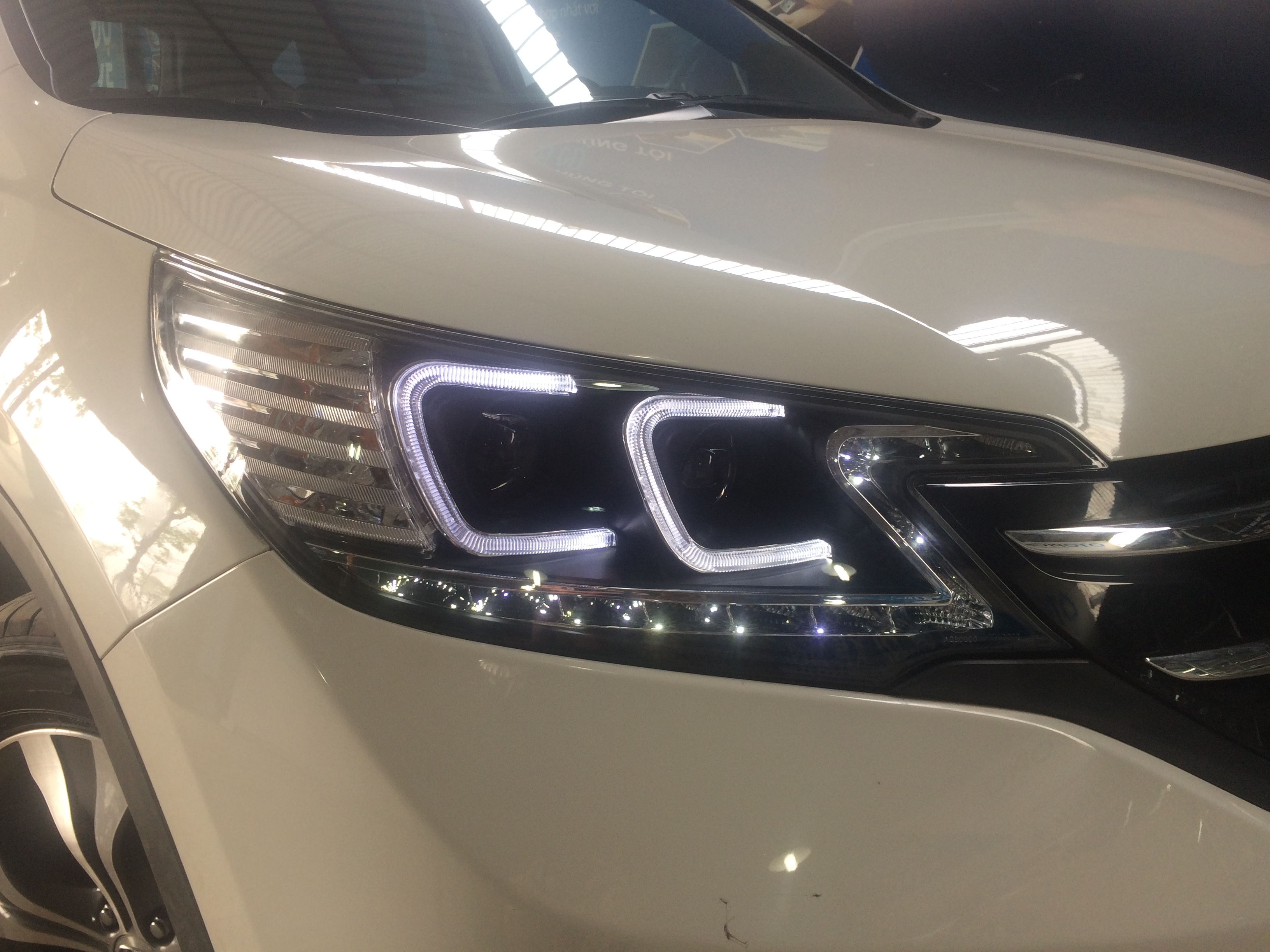 Honda CRV 2014 thay đèn nguyên bộ